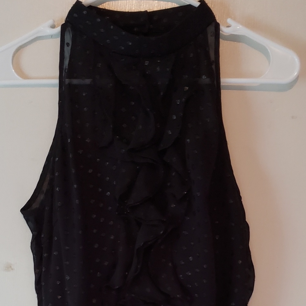 A backless neck high dress